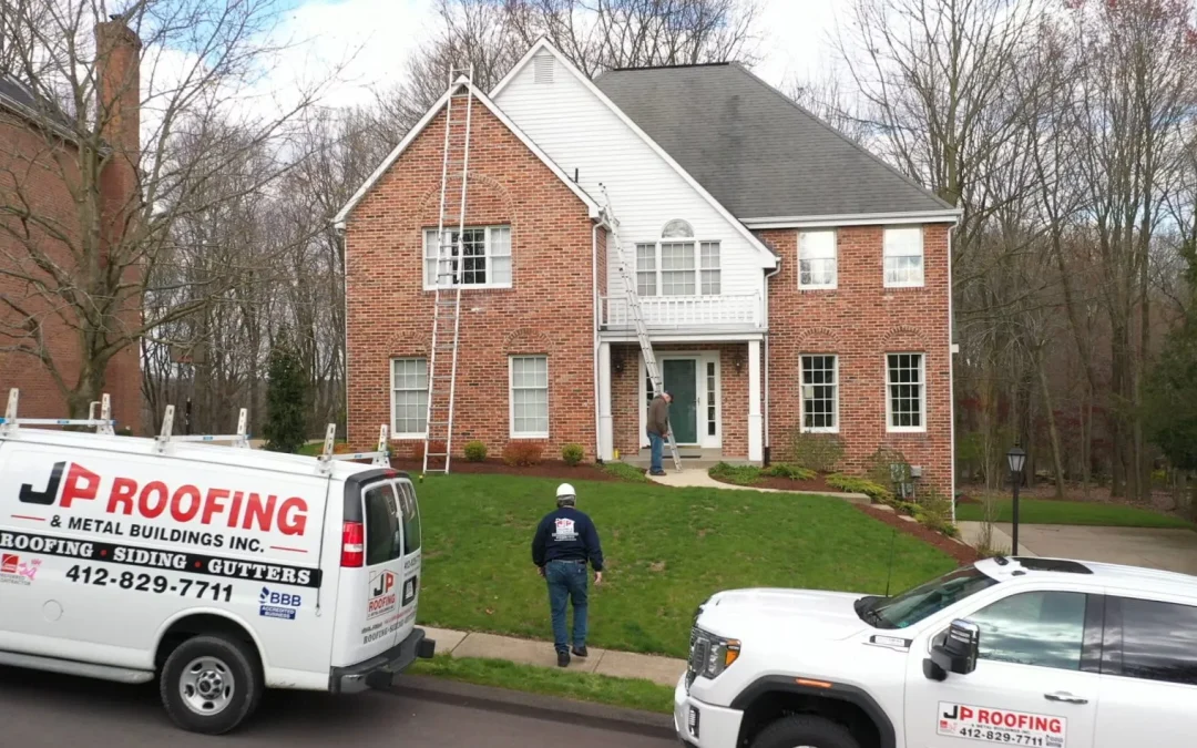 Residential Roofers Near You - JP Roofing replacing roof on residential home