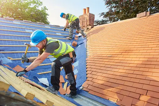 roofing professionals installing new roof