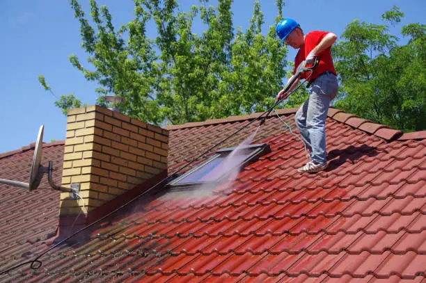 How to clean roof shingles